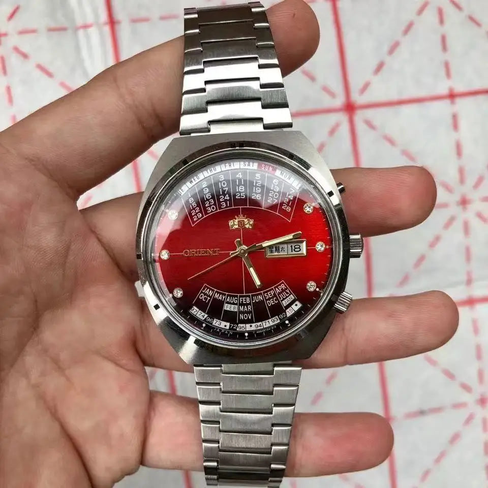 automatic mechanical Orient unisex watch with rotating large dial, fully functional stainless steel world time