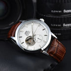 Orient automatic mechanical unisex watch with hollowed out personalized dial, fully functional world time leather strap