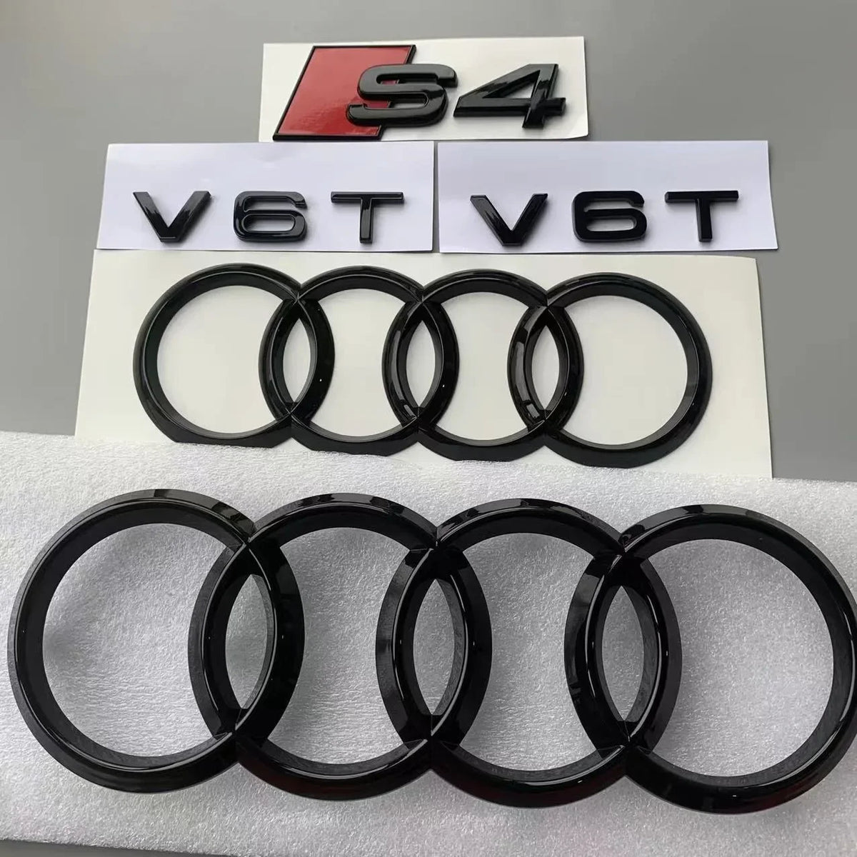 ABS 4-Ring Bright Black Car Hood Front Grill Emblem Rear Trunk Badge V6T Sticker Modified Accessories for Audi S4 2020-2024