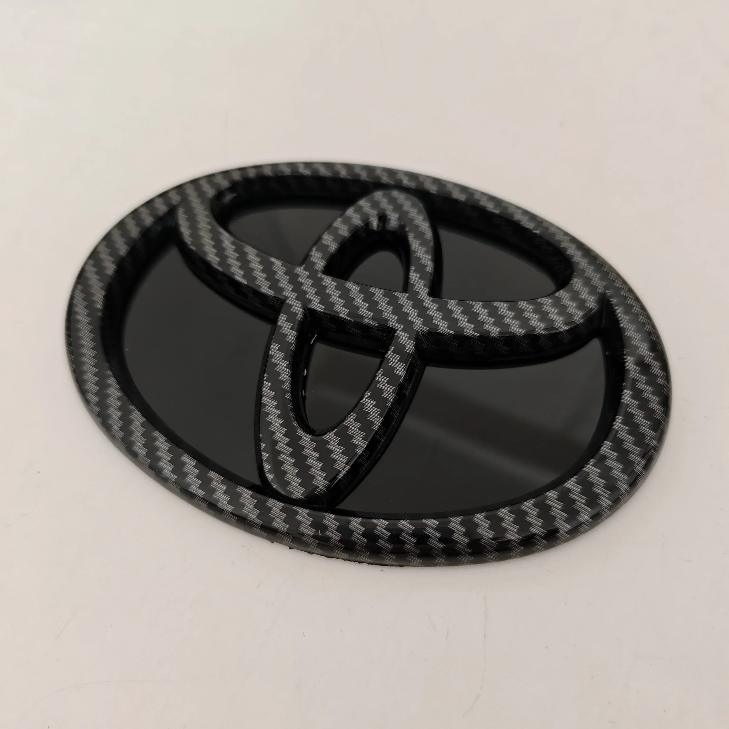 for Toyota RAV4 CAMRY COROLLA LANDCRUSER RAV4 VIOS SIENNA YARLS Modified Black Bottom Front Grille Badge Trunk Car Logo Suitable