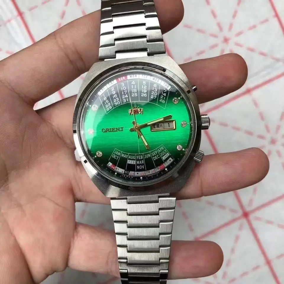 automatic mechanical Orient unisex watch with rotating large dial, fully functional stainless steel world time