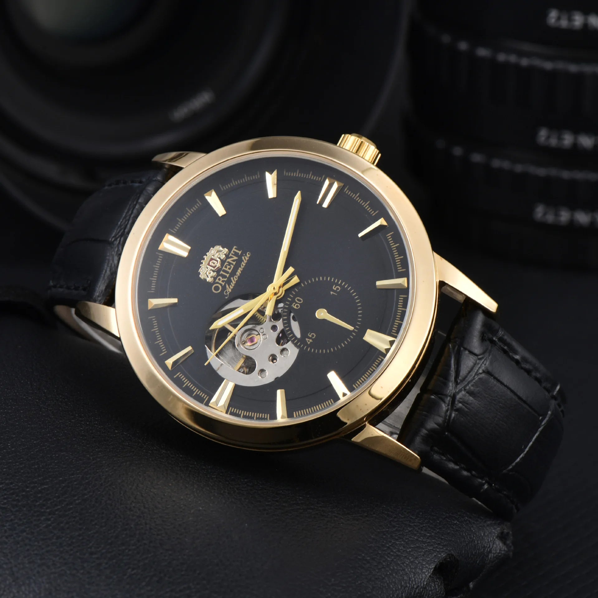 Orient automatic mechanical unisex watch with hollowed out personalized dial, fully functional world time leather strap