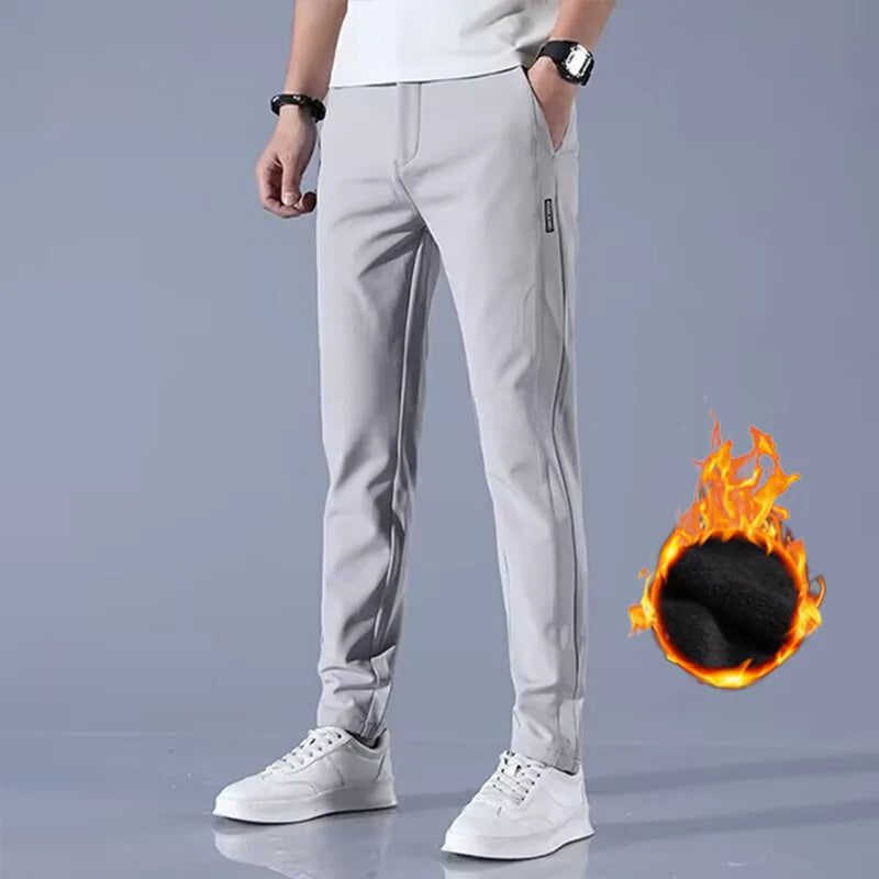 Pantalones informales de terciopelo para hombre, pantalones gruesos de negocios elásticos ajustados con cintura elástica para correr al aire libre, pantalones clásicos coreanos de lana para invierno 2024
