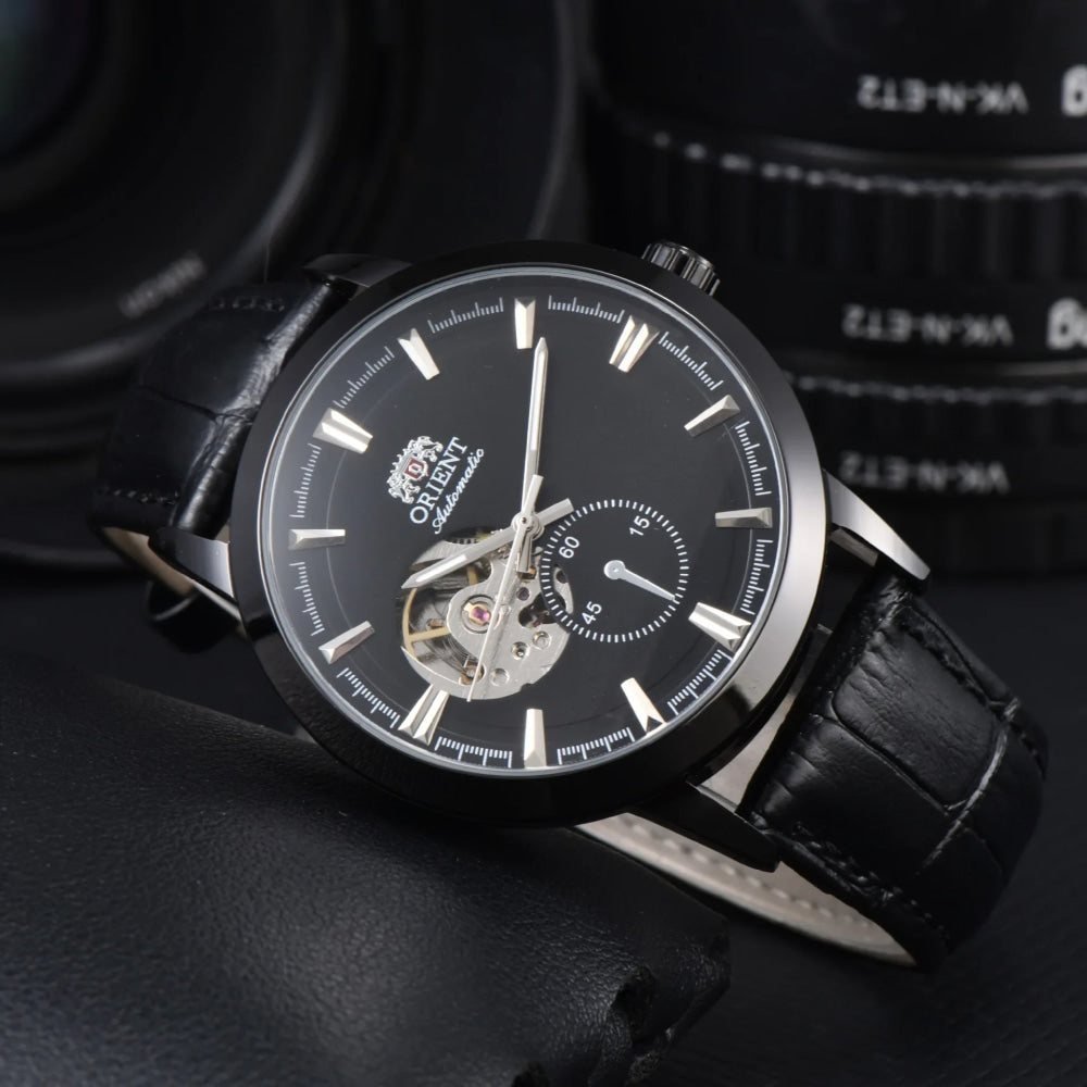 Orient automatic mechanical unisex watch with hollowed out personalized dial, fully functional world time leather strap