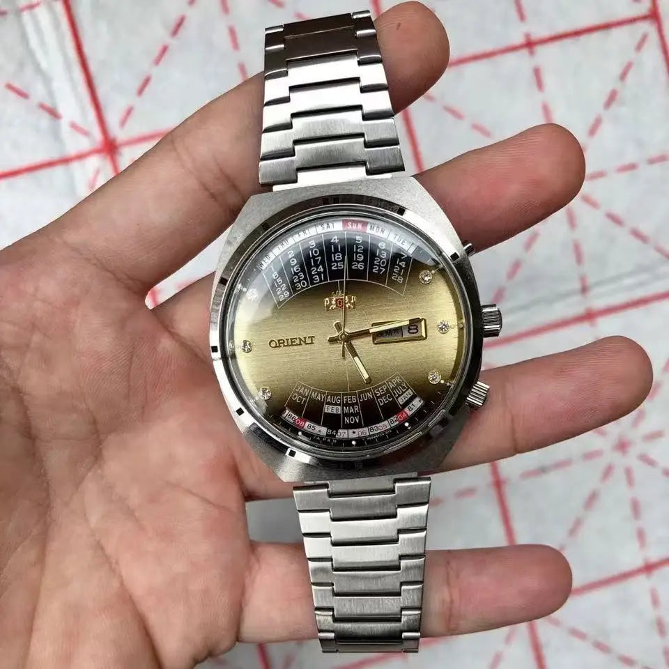 automatic mechanical Orient unisex watch with rotating large dial, fully functional stainless steel world time