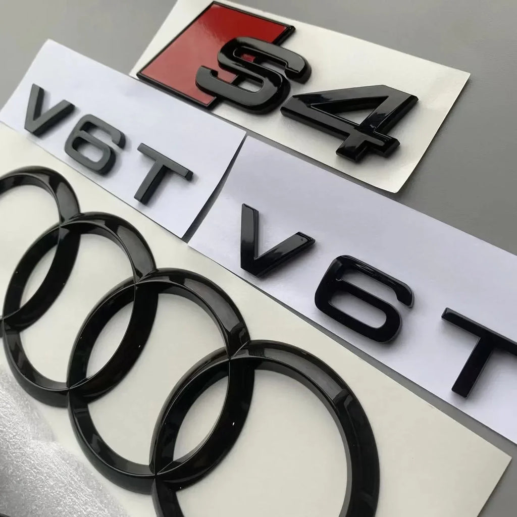 ABS 4-Ring Bright Black Car Hood Front Grill Emblem Rear Trunk Badge V6T Sticker Modified Accessories for Audi S4 2020-2024