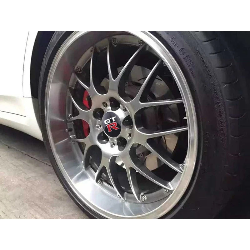 4Pcs 56 60MM Car Emblem Wheel Hub Caps Stickers Hubcap Badge Decals For Nissan Nismo X-trail Almera Tiida Patrol Teana J32 GTR