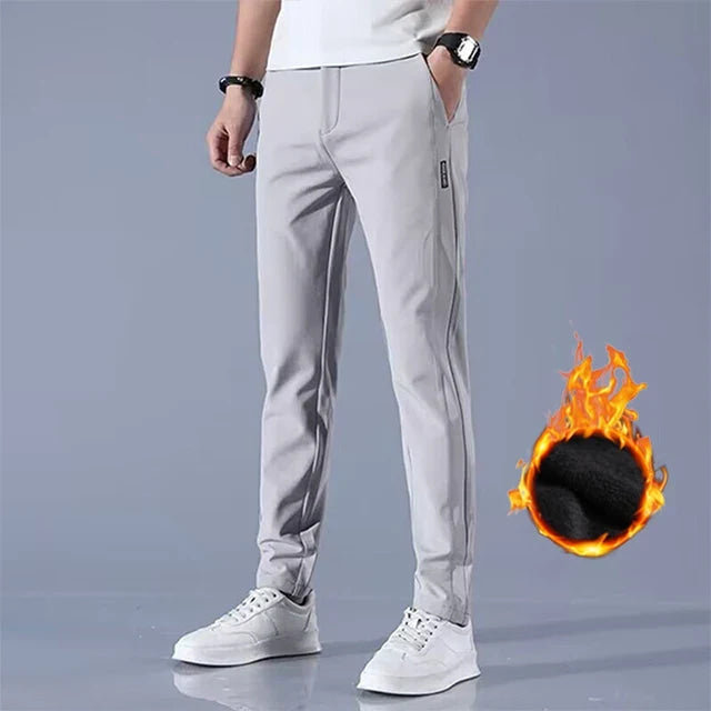 Pantalones informales de terciopelo para hombre, pantalones gruesos de negocios elásticos ajustados con cintura elástica para correr al aire libre, pantalones clásicos coreanos de lana para invierno 2024