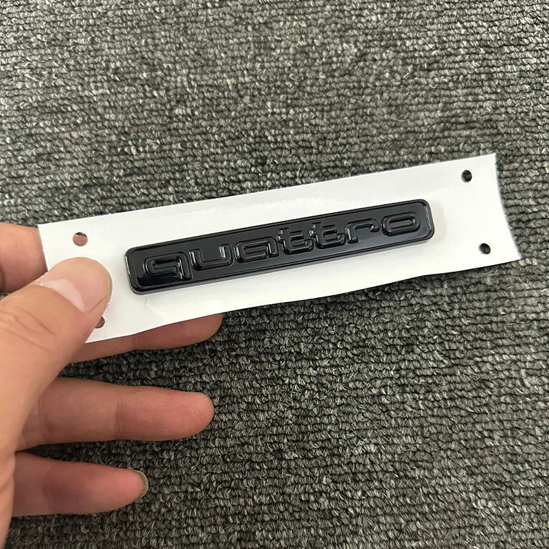 The new ABS letter 3D sticker Quattro Sline 2.0T is suitable for the modification of Audi A4 2008-2017 glossy black suitcase.