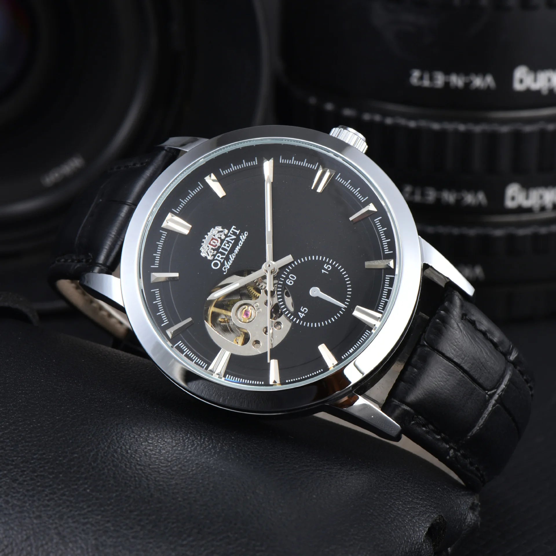 Orient automatic mechanical unisex watch with hollowed out personalized dial, fully functional world time leather strap