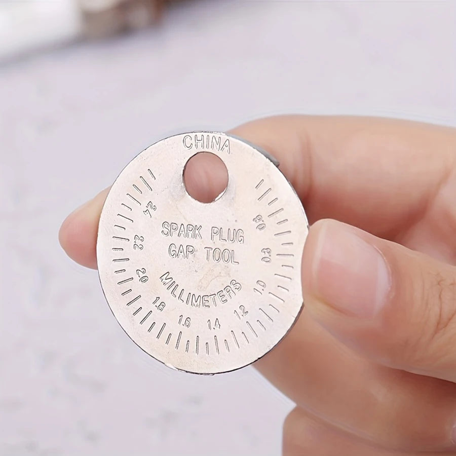 Herramienta de medición de espacio de bujía tipo moneda, rango de 0,6-2,4mm, herramienta de medición de huecos de bujía, 1 ud.