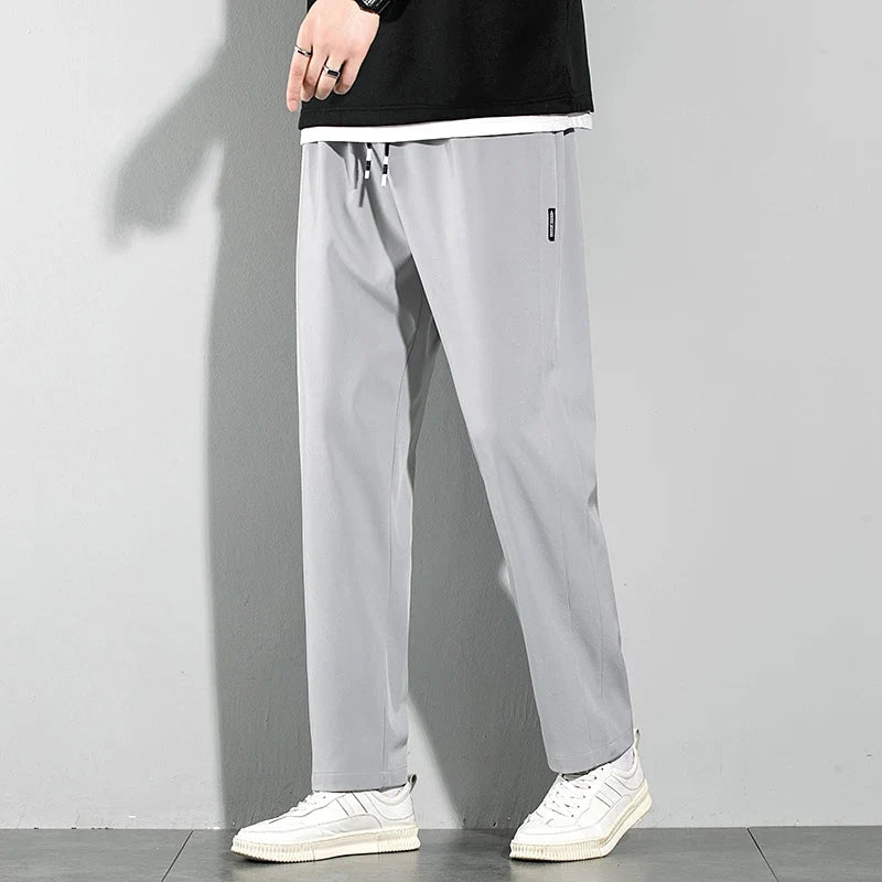 Pantalones de seda de hielo para hombre, novedad de verano 20225, pantalones informales de negocios finos negros y grises, pantalones de chándal de pierna recta transpirables elásticos para exteriores