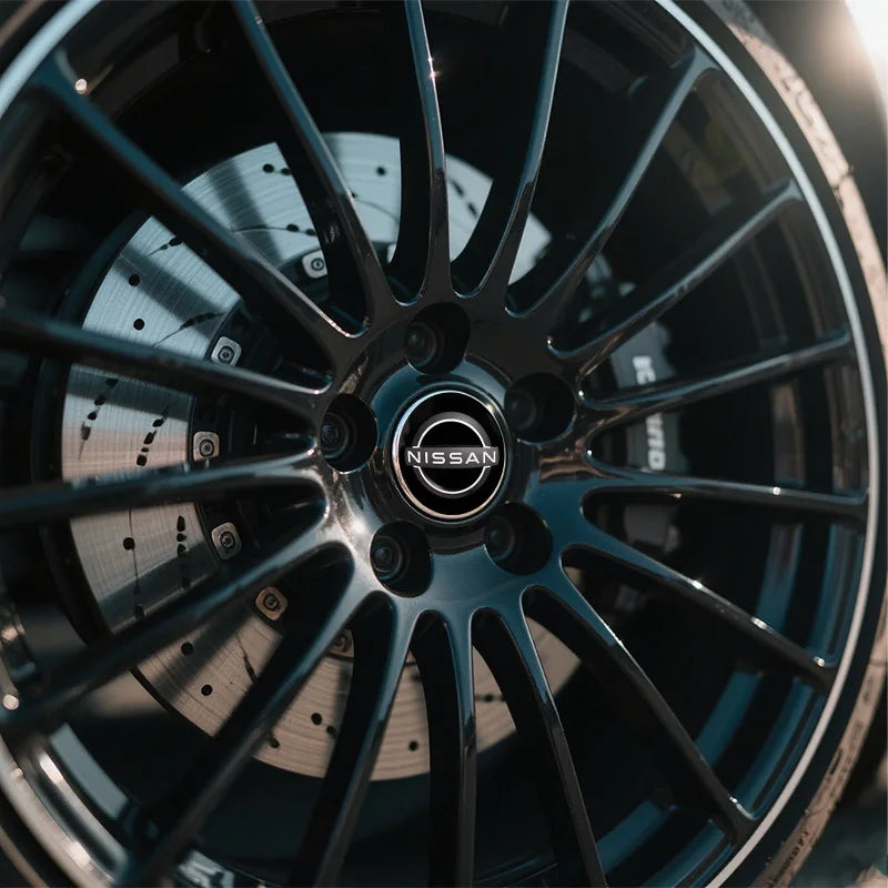 56mm Car Wheel Stickers Center Hub Cap Car Emblem Badge For Nismo Nissans Tiida Teana Skyline Juke X-trail Almera Qashqai Goods