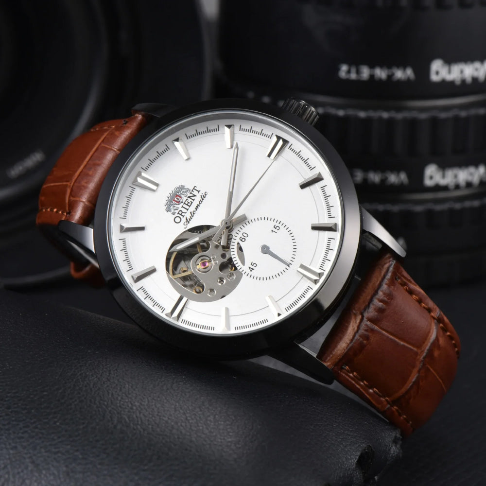 Orient automatic mechanical unisex watch with hollowed out personalized dial, fully functional world time leather strap