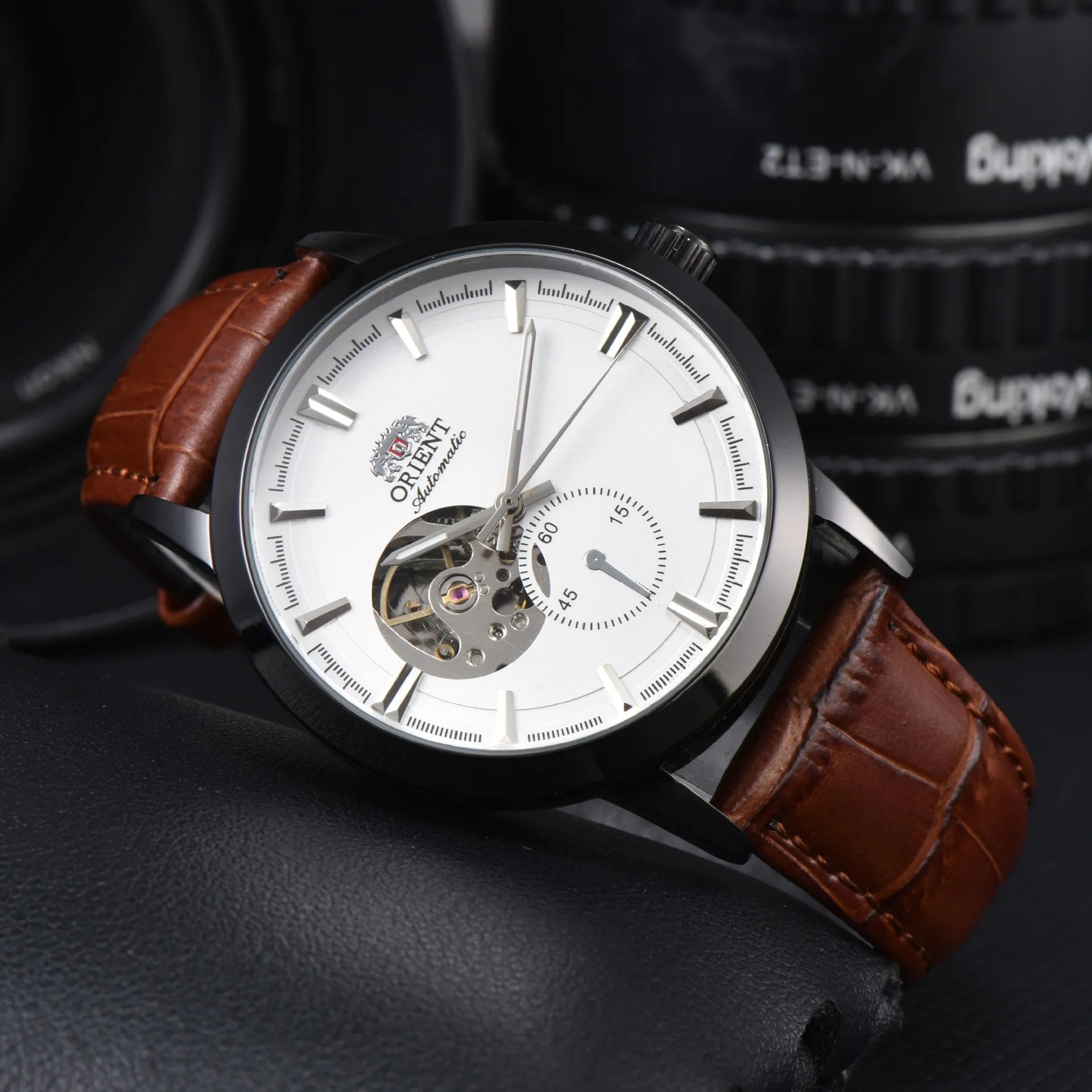 Orient automatic mechanical unisex watch with hollowed out personalized dial, fully functional world time leather strap