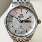 Orient Two-Tone Automatic Watch Multi-Color Dial Roman Numerals Day-Date Steel Band 50M Water Resistant Men's Classic Wristwatch